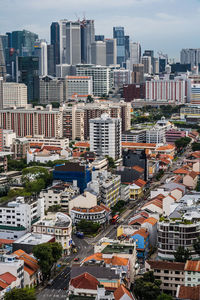 High angle view of buildings in city against sky