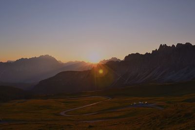 Scenic view of mountains against sky during sunset