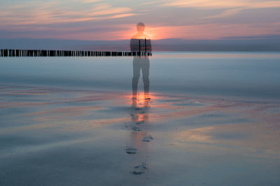 Scenic view of sea at sunset