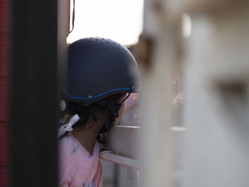 Portrait of woman looking at camera