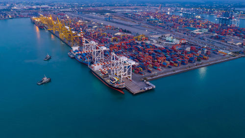 Container ship terminal, unloading and quay crane of container ship at industrial port 