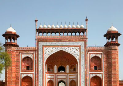 Facade of agra fort against clear sky