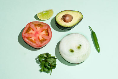 High angle view of fruits against white background