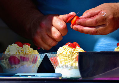 Close-up of man holding ice cream