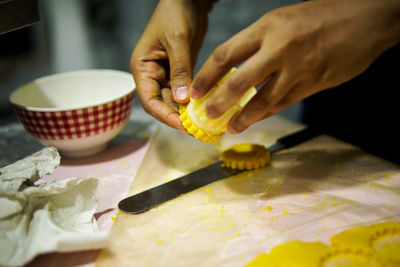 Close-up of person preparing food