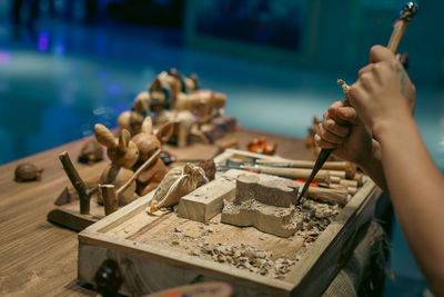 Master at work in a wooden and ceramic crafting shop in the greater bay area