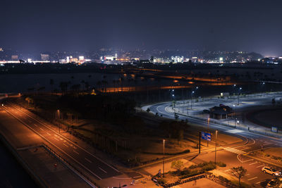 High angle view of illuminated city at night