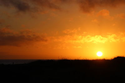 Scenic view of sunset over sea