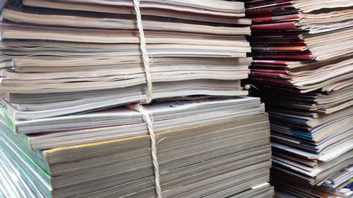 Close-up of stack of magazines