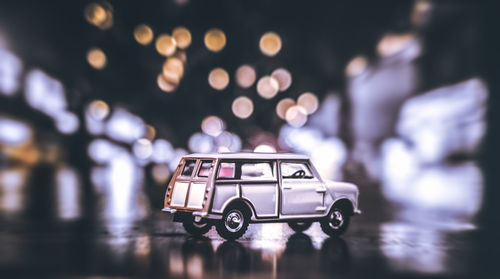 Vintage car on street at night