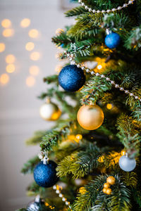 Close-up of christmas decoration hanging on tree