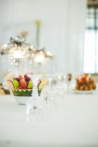 Decorated dining table at wedding reception
