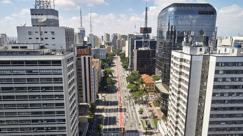 Modern buildings in city against sky