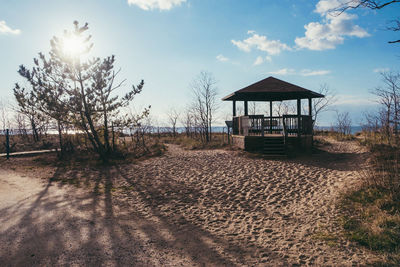 View of built structure on landscape against sky