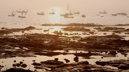 Scenic view of sea at sunset