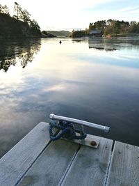 Pier on lake against sky