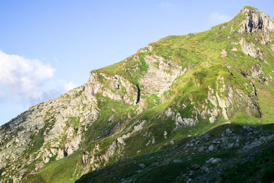 Scenic view of rocky mountains against sky, fagaras mountains, romania