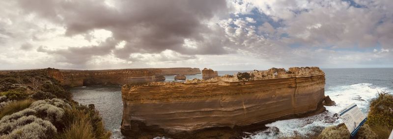 Panoramic view of sea against cloudy sky