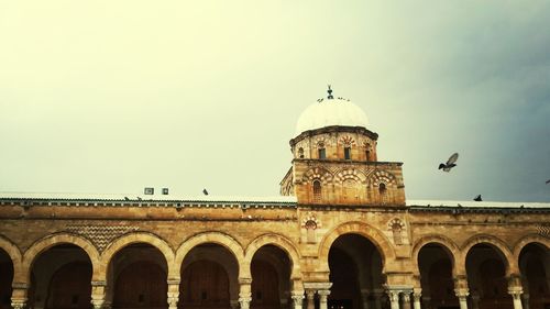 Low angle view of historic building against sky