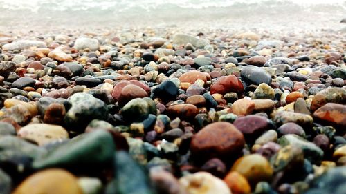 Close-up of pebbles on beach