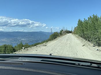 Road seen through car windshield