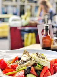 Close-up of meal served in restaurant on street cafe in athens