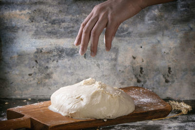 Close-up of human hand on table