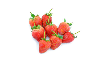 Close-up of strawberry over white background