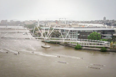 View of bridge over river in city