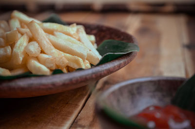 Close-up of chopped slices in bowl on table
