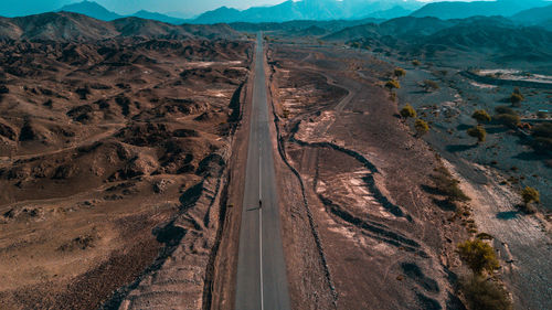 High angle view of road passing through desert