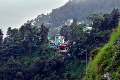 High angle view of trees and mountains against sky