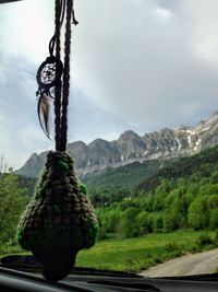 Close-up of metal structure against sky