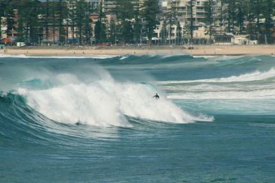 View of person surfing at beach