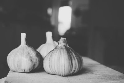 Close-up of garlic on cutting board