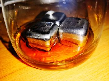 Close-up of beer glass on table