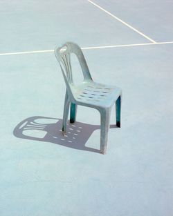 Empty chair at sports court 