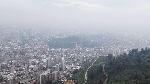 Aerial view of city in foggy weather