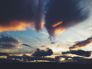 Scenic view of cloudy sky at sunset