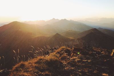 Scenic view of mountains against sky at morning