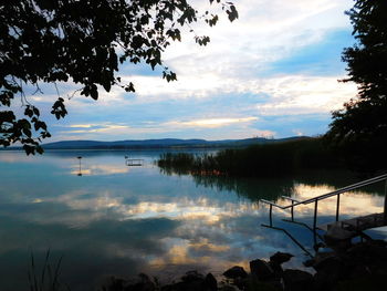 Reflection of clouds in calm lake