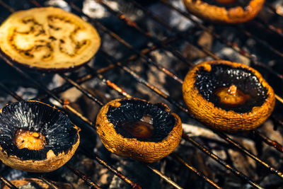 High angle view of eggs on barbecue grill