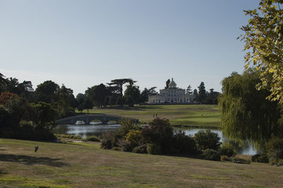 View of trees and buildings against sky