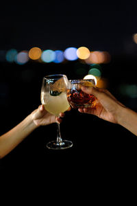 Close-up of hand holding wine glass