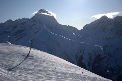 Scenic view of snowcapped mountains against sky. snowing mountain. les deux alps in france.