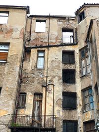 Low angle view of old building in city