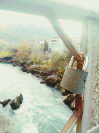 Close-up of padlock on railing