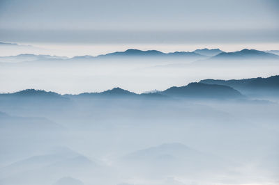 Scenic view of mountains against sky during sunset