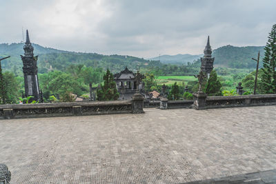 View of temple against building