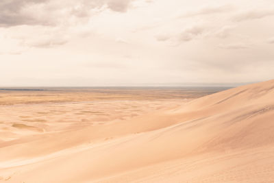 Scenic view of desert against sky